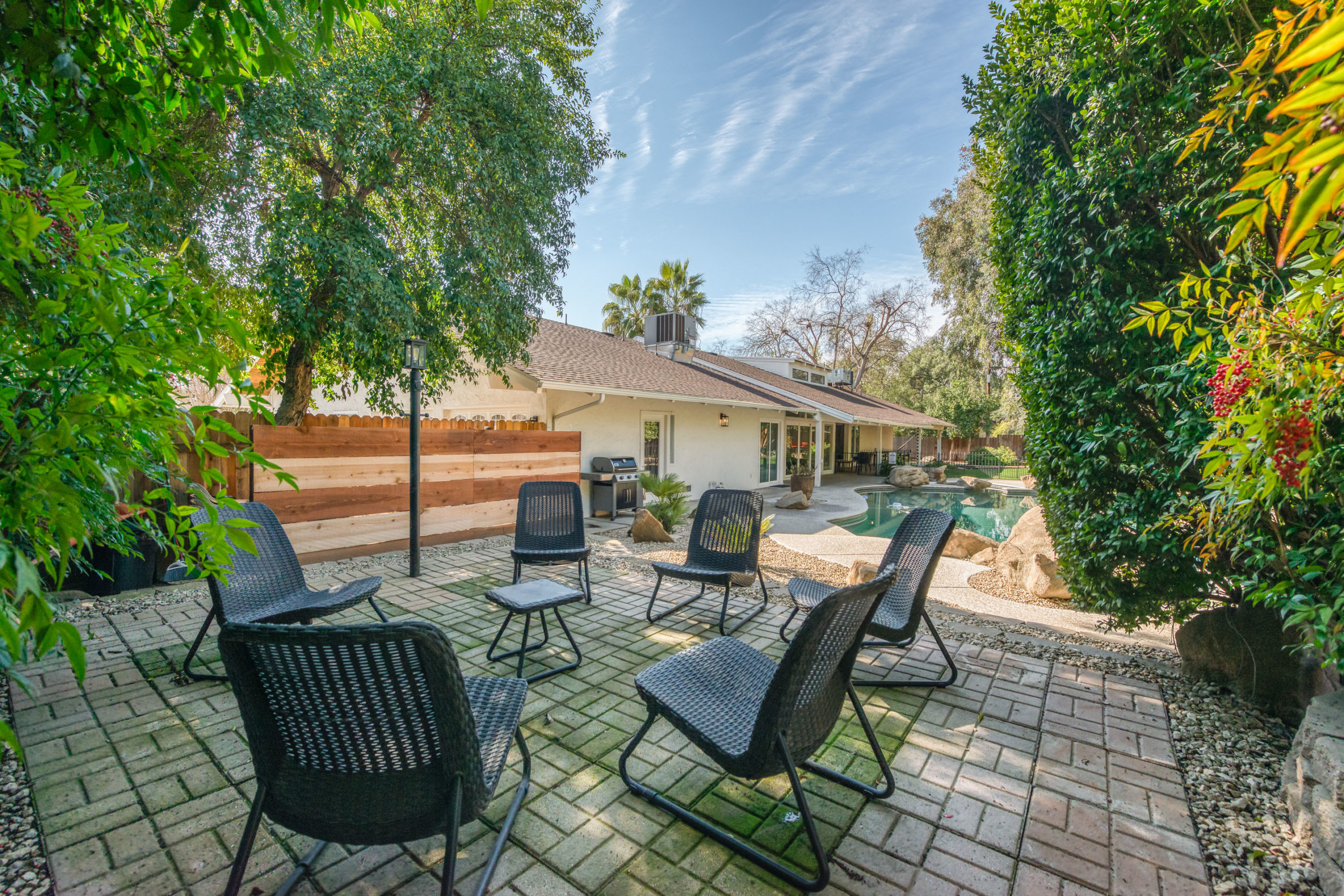 Outdoor seating area surrounded by trees