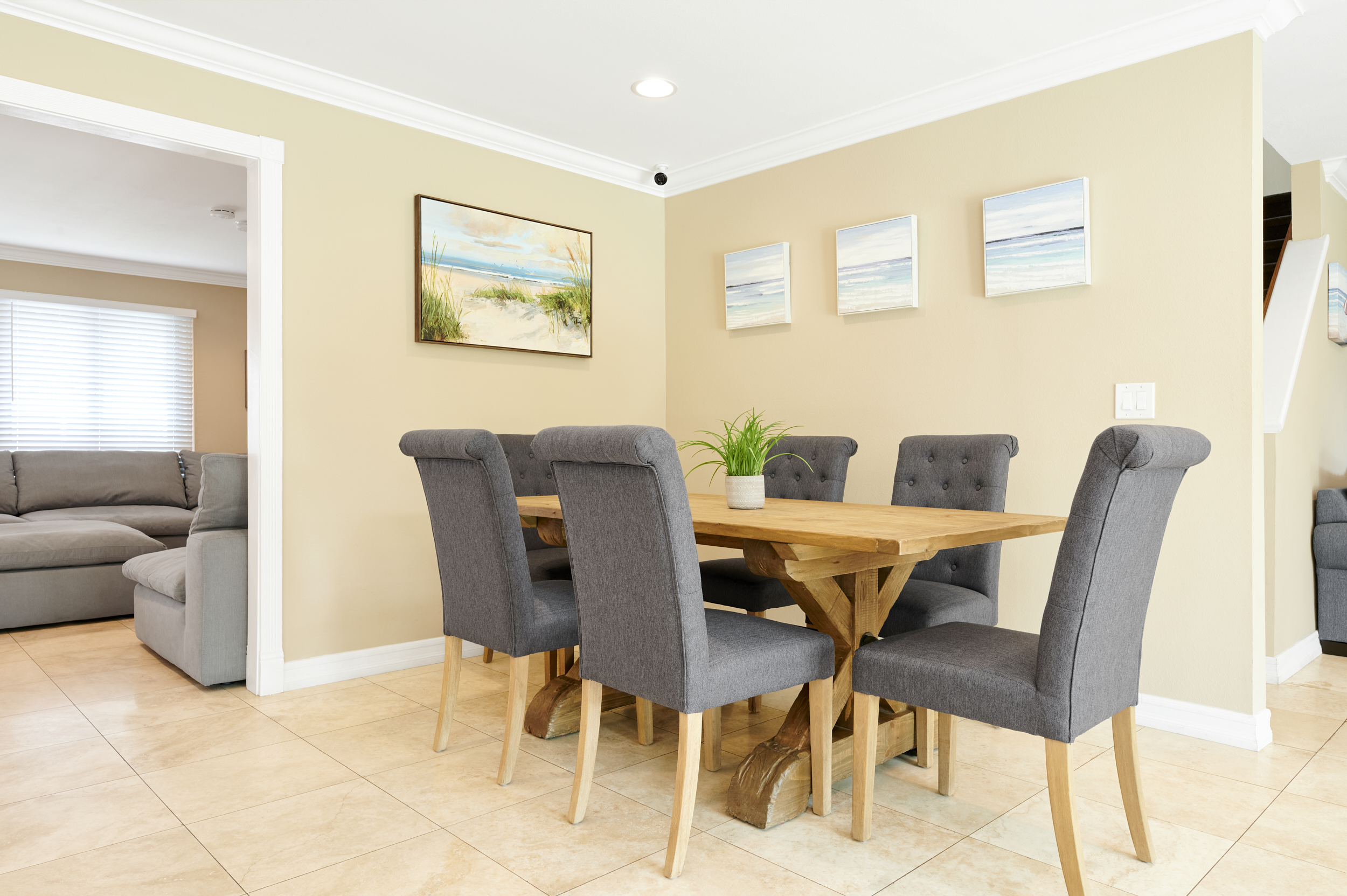 Dining area with a table and chairs.