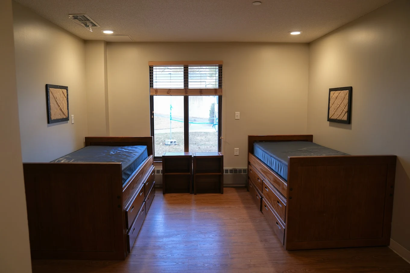 Shared bedroom with two beds at EOSIS Tapestry