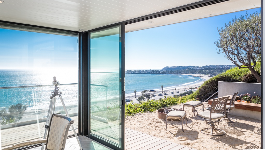 Outdoor seating area with an umbrella.