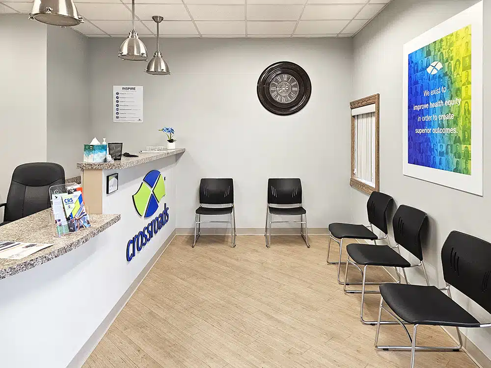 Waiting area with chairs and reception counter