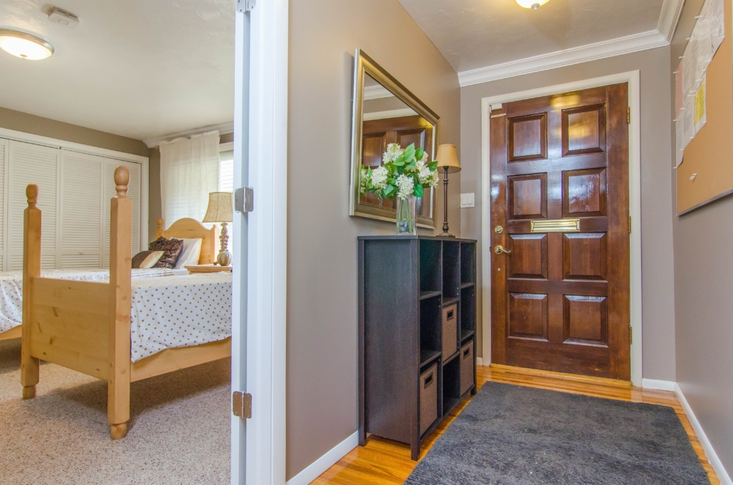 Hallway with view into shared bedroom