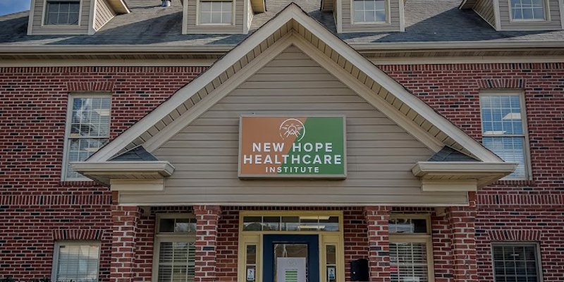 Brick rehab center with a "New Hope Healthcare Institute" sign.