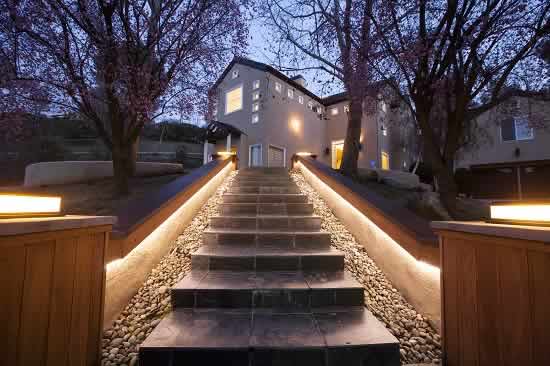 Night view of front entry with lit stairway