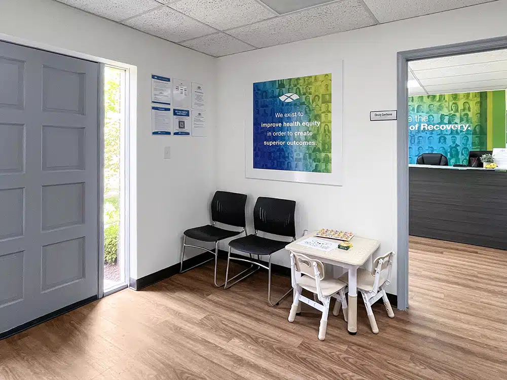 Clinic entrance with seating and check-in area