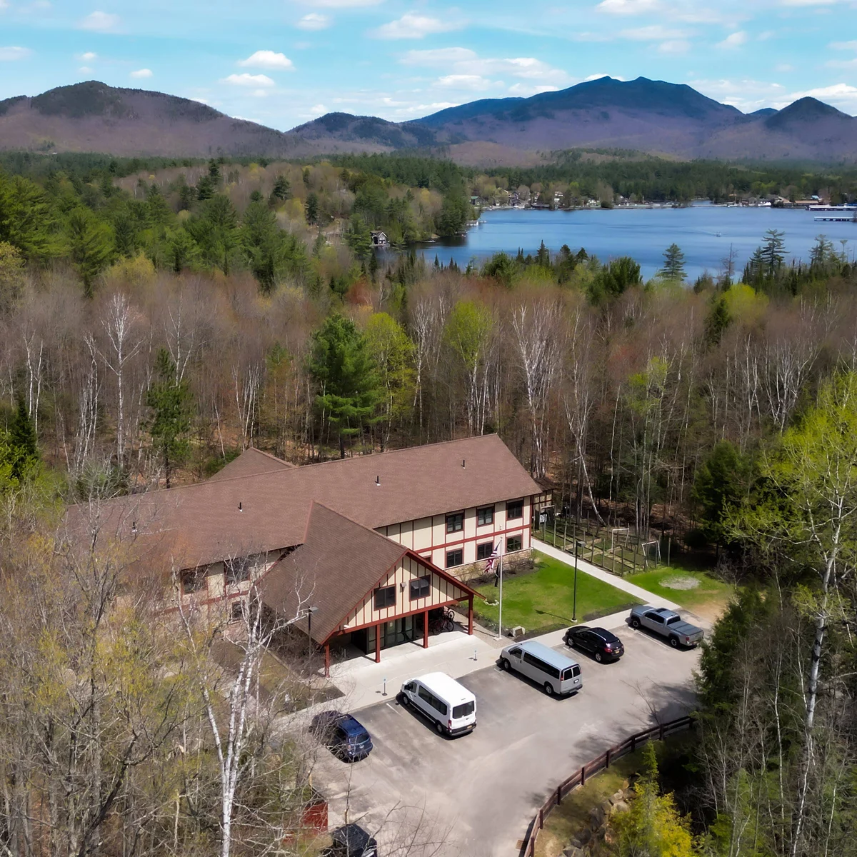 Aerial view of residential treatment center near forest and lake