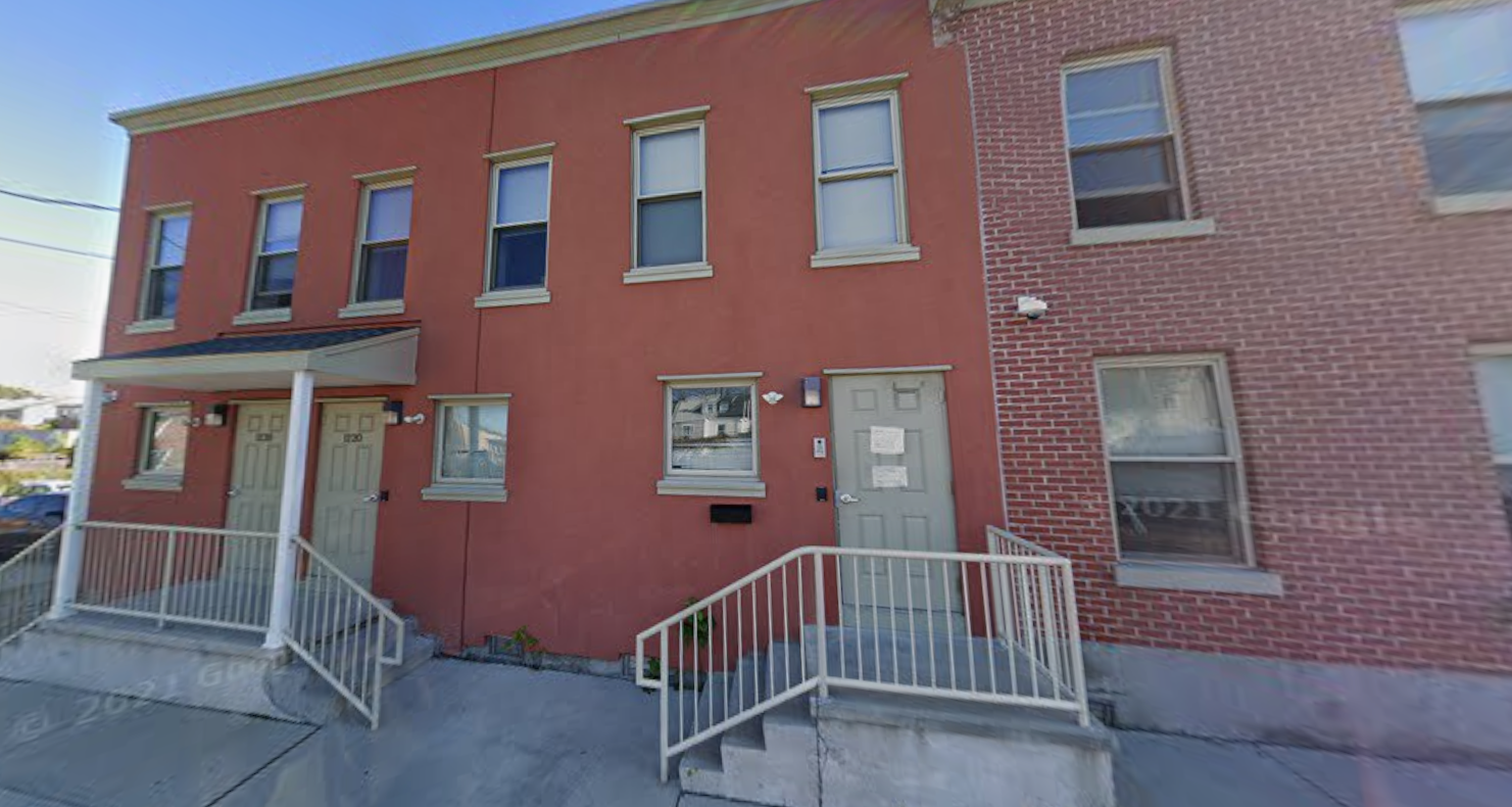 Front view of CORAS women’s residential building with entry steps