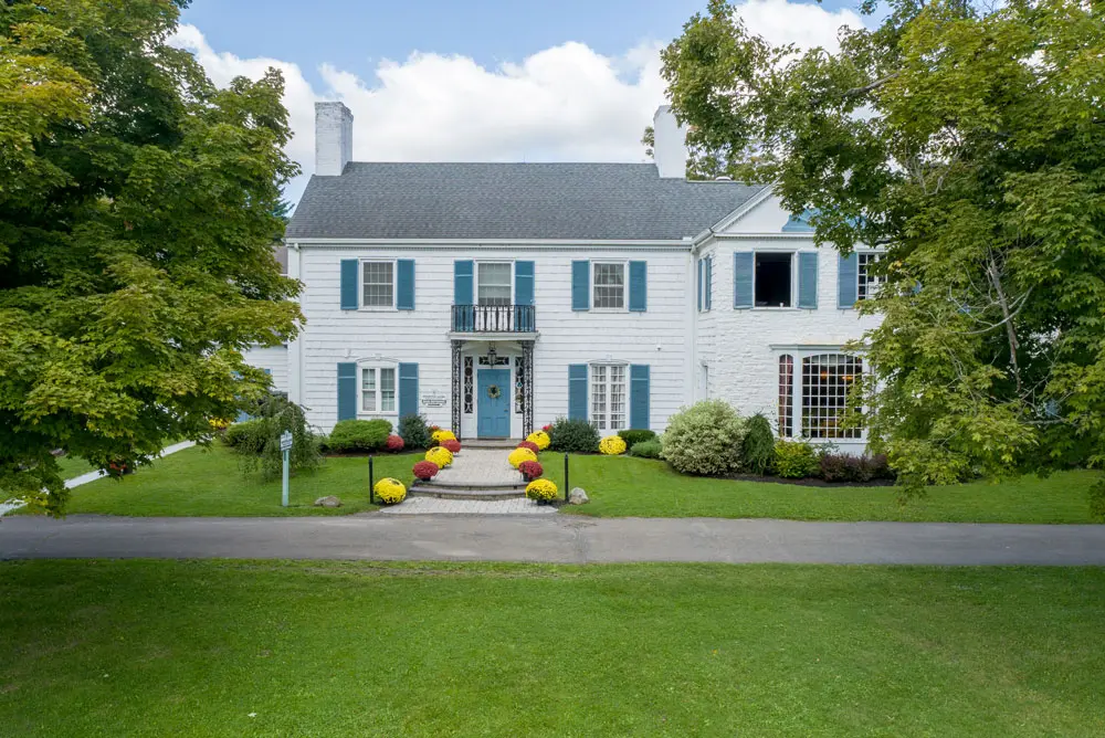 Front entrance of recovery center with landscaped lawn