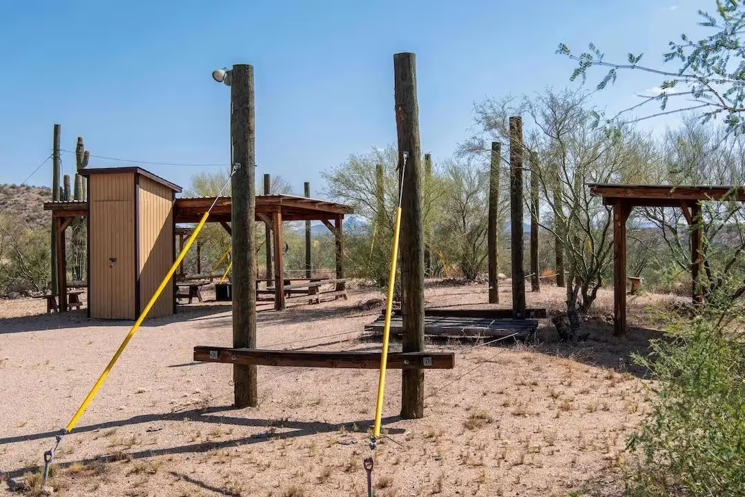 Outdoor ropes and obstacle course in desert setting