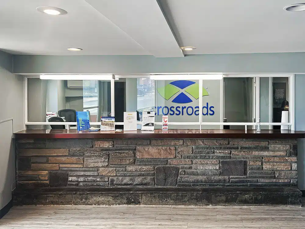Reception desk with glass partition at treatment center