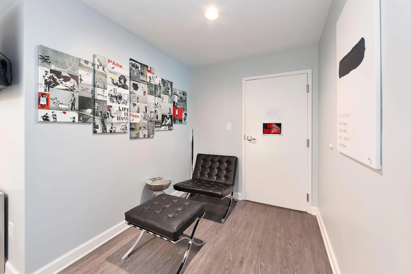 Private therapy room with lounge chair and wall art
