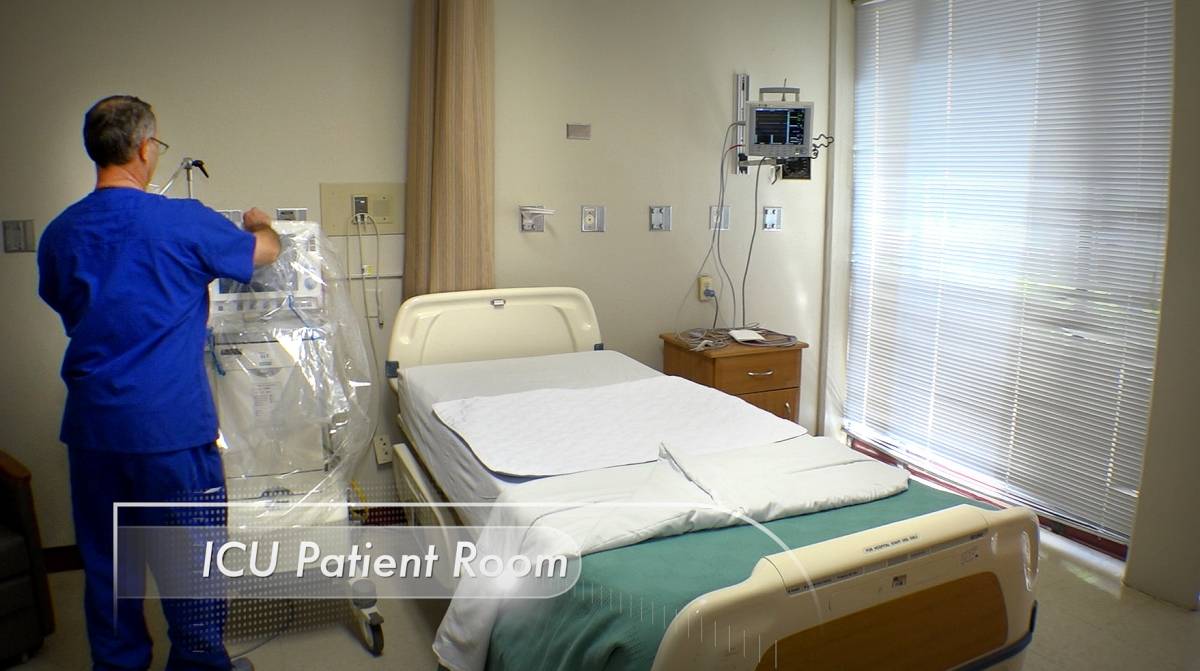 ICU room with hospital bed and equipment