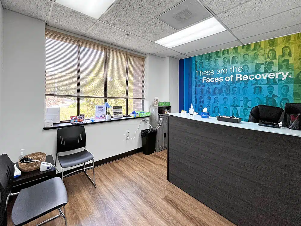 Reception desk and waiting chairs in recovery clinic