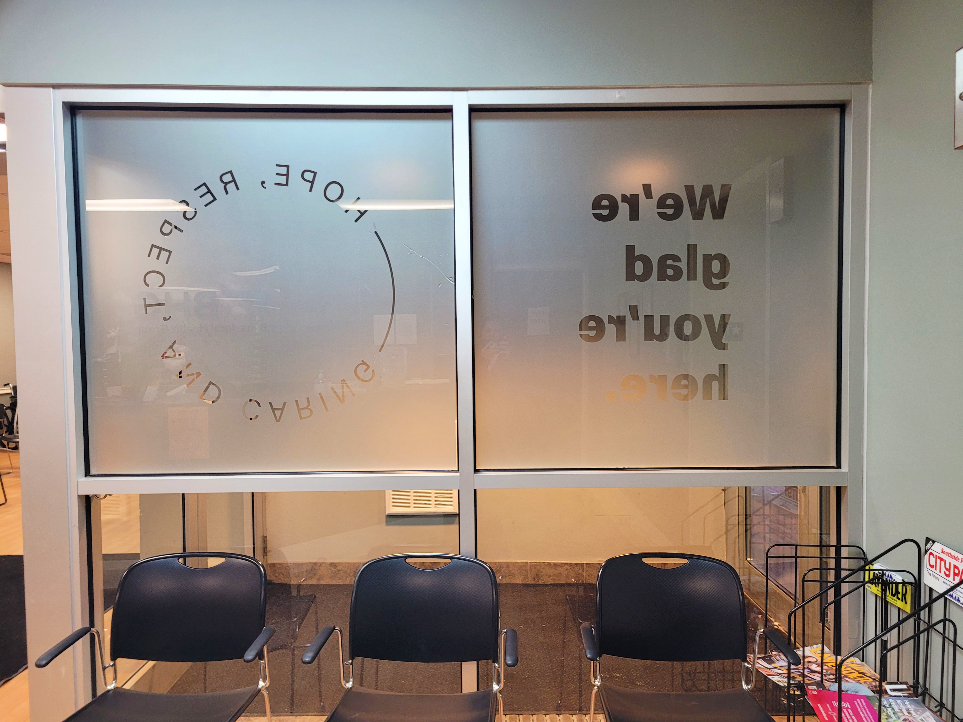 Waiting area with frosted windows and guest seating