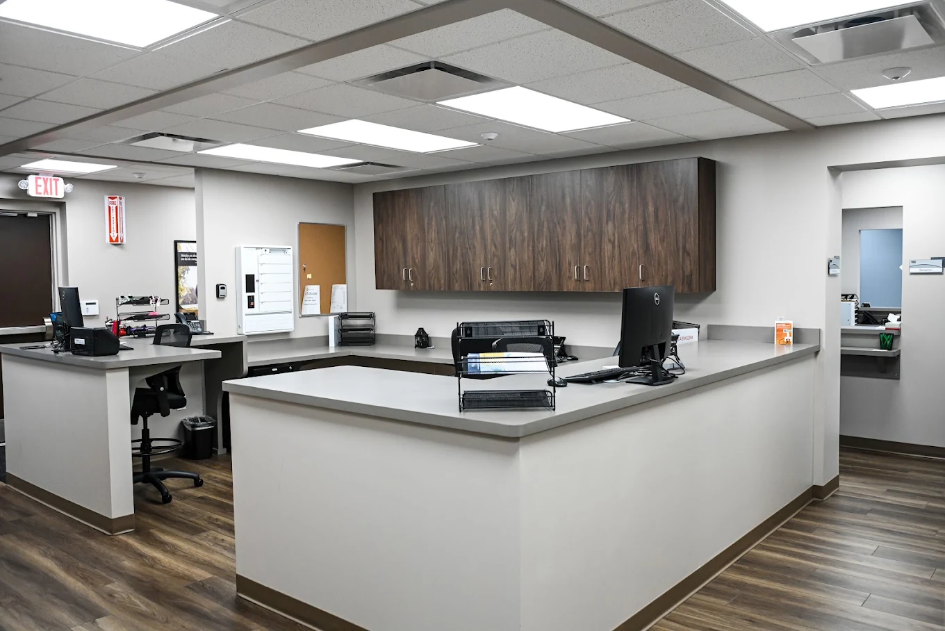 Central nursing station with administrative workspace