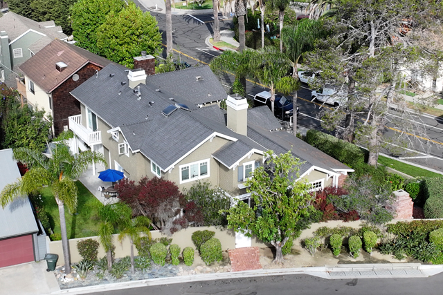 Aerial view of residential-style rehab facility with landscaped yard.