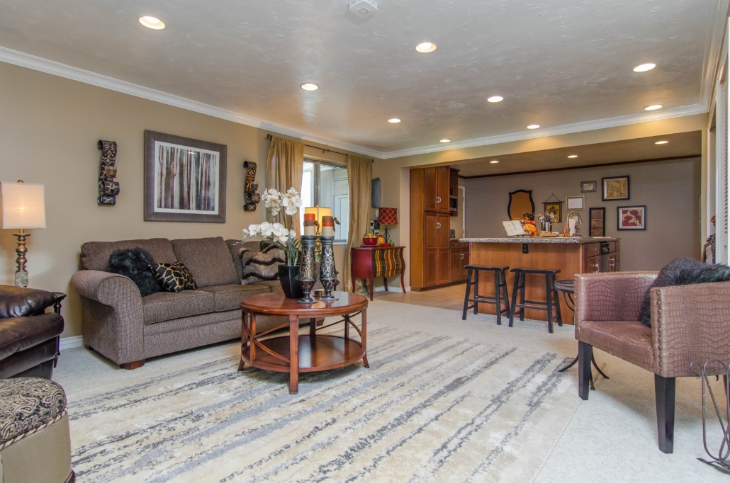 Spacious living room with couch and round coffee table