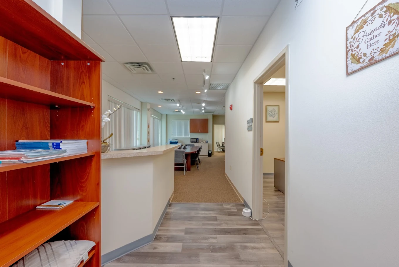 Interior hallway leading to reception and office areas
