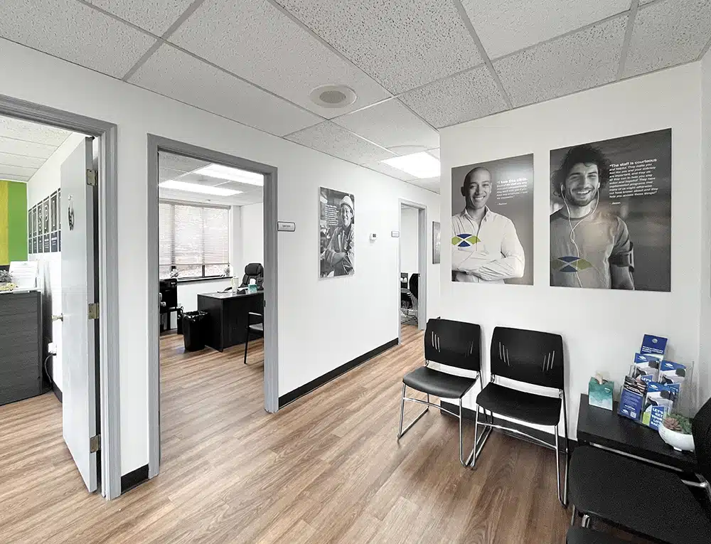 Hallway seating with patient rooms in treatment center