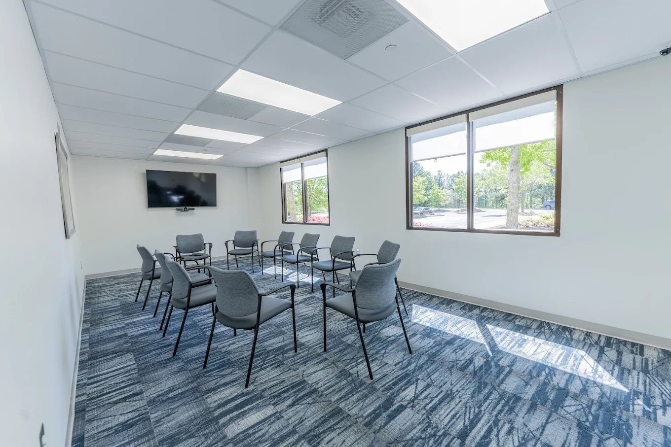 Group therapy room with chairs arranged in a circle