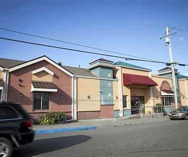 Front view of the treatment facility building from the street.