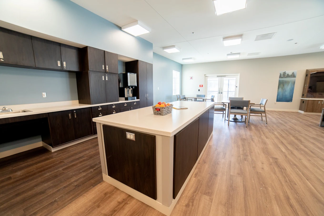 Community kitchen with island and shared seating area