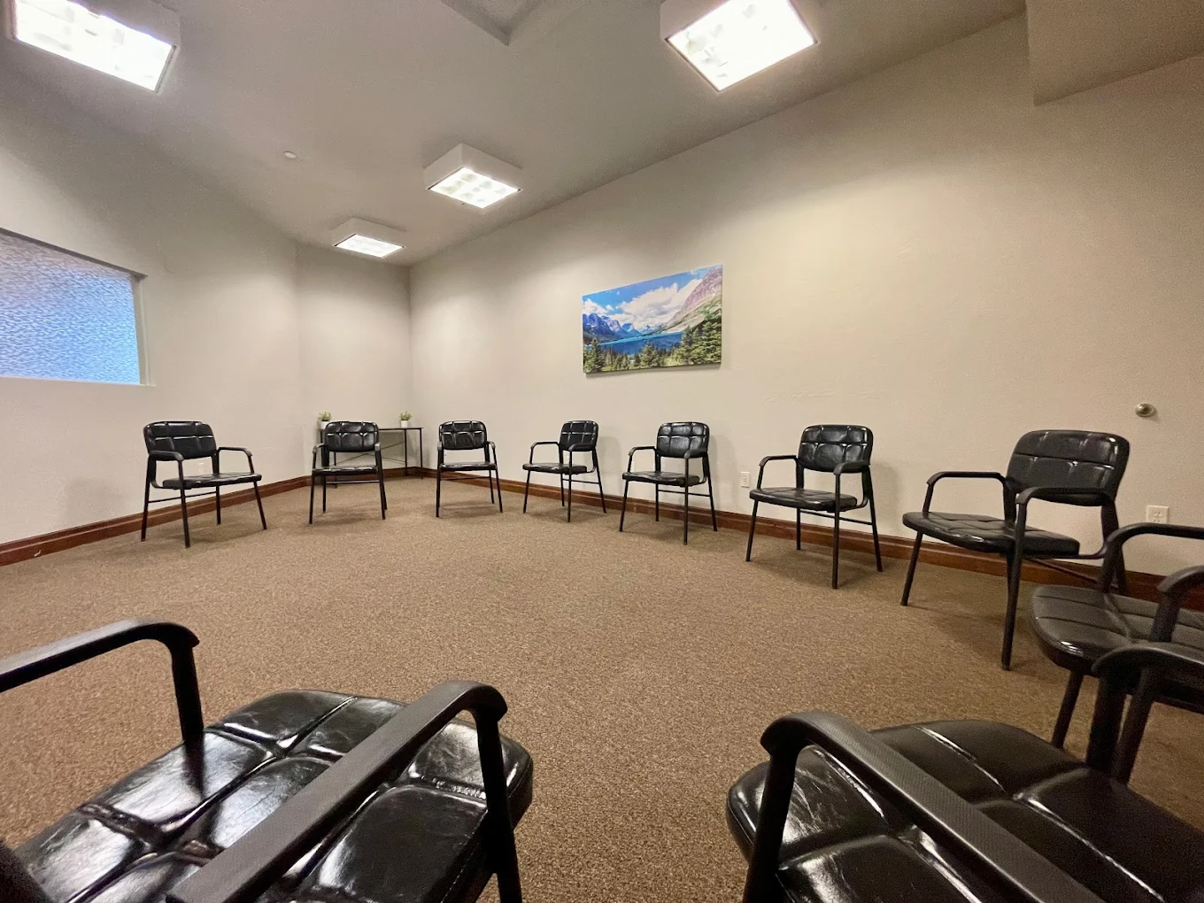 Group therapy room with chairs in a circle