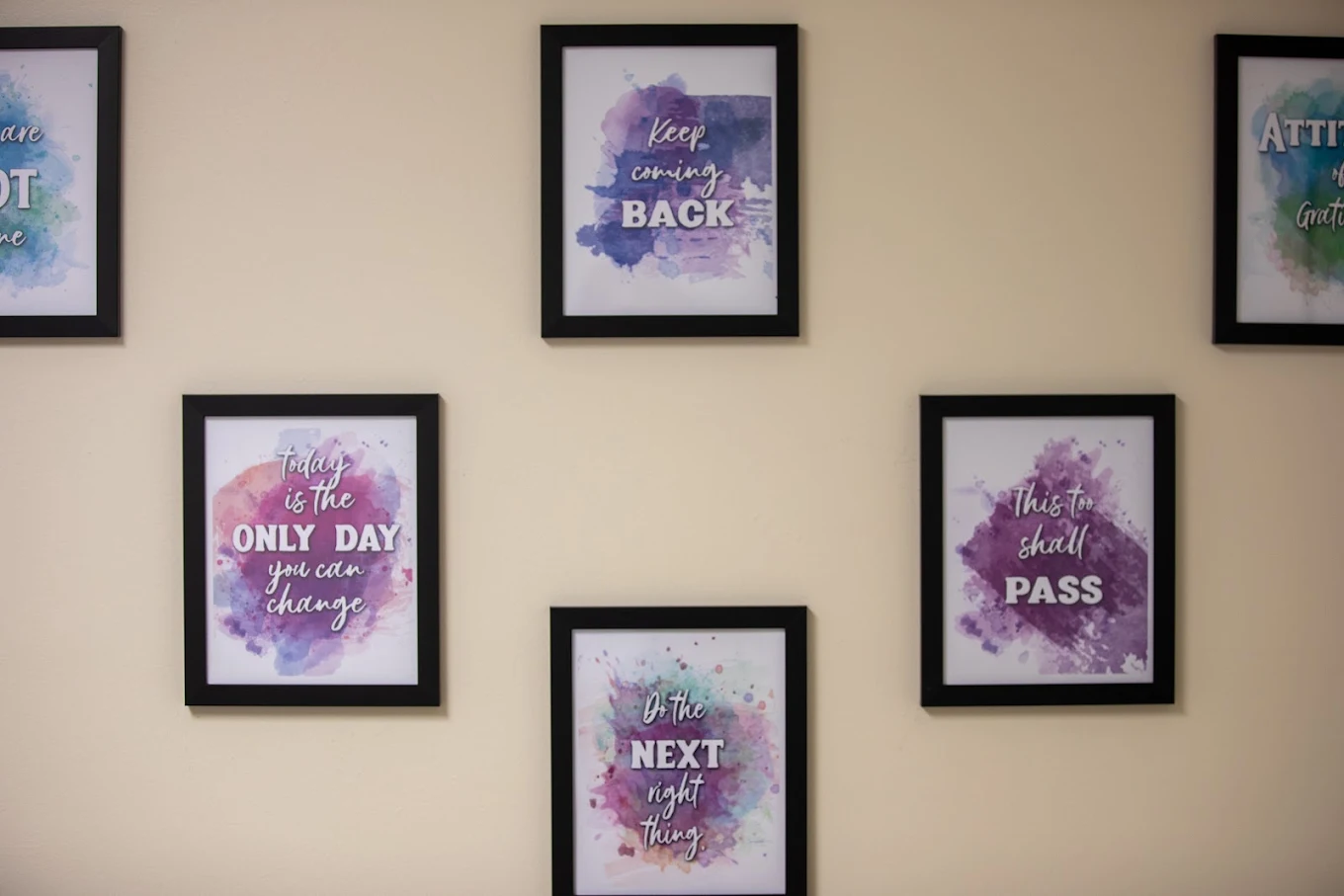 Framed motivational artwork displayed on an interior wall