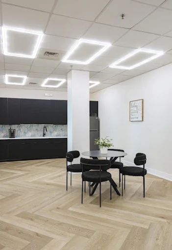 Small dining table beside kitchenette area