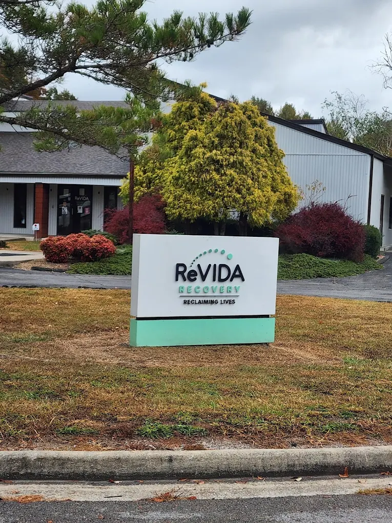 ReVIDA Recovery sign in front of landscaped building