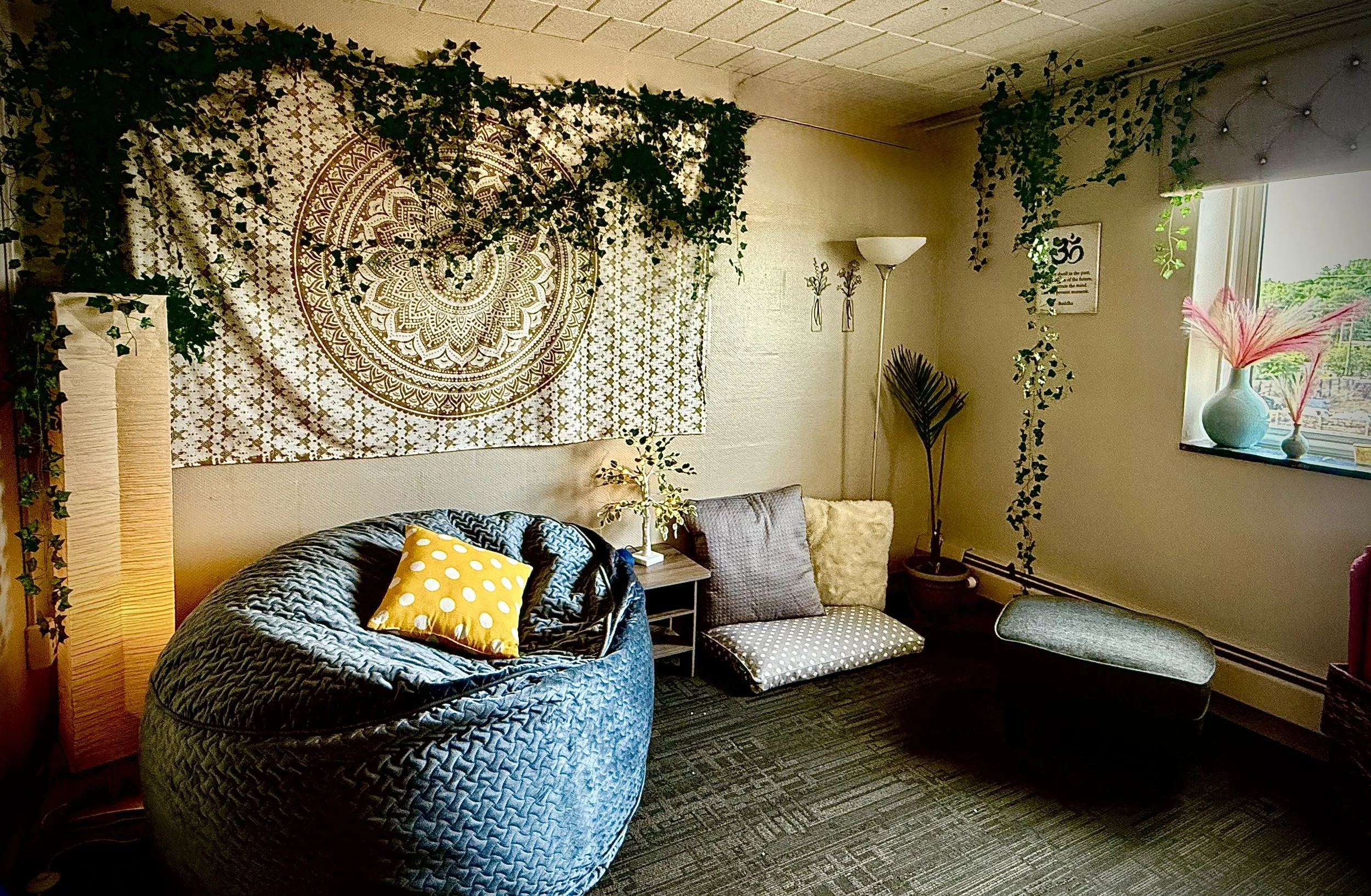 Relaxation room with bean bag seating and calming decor