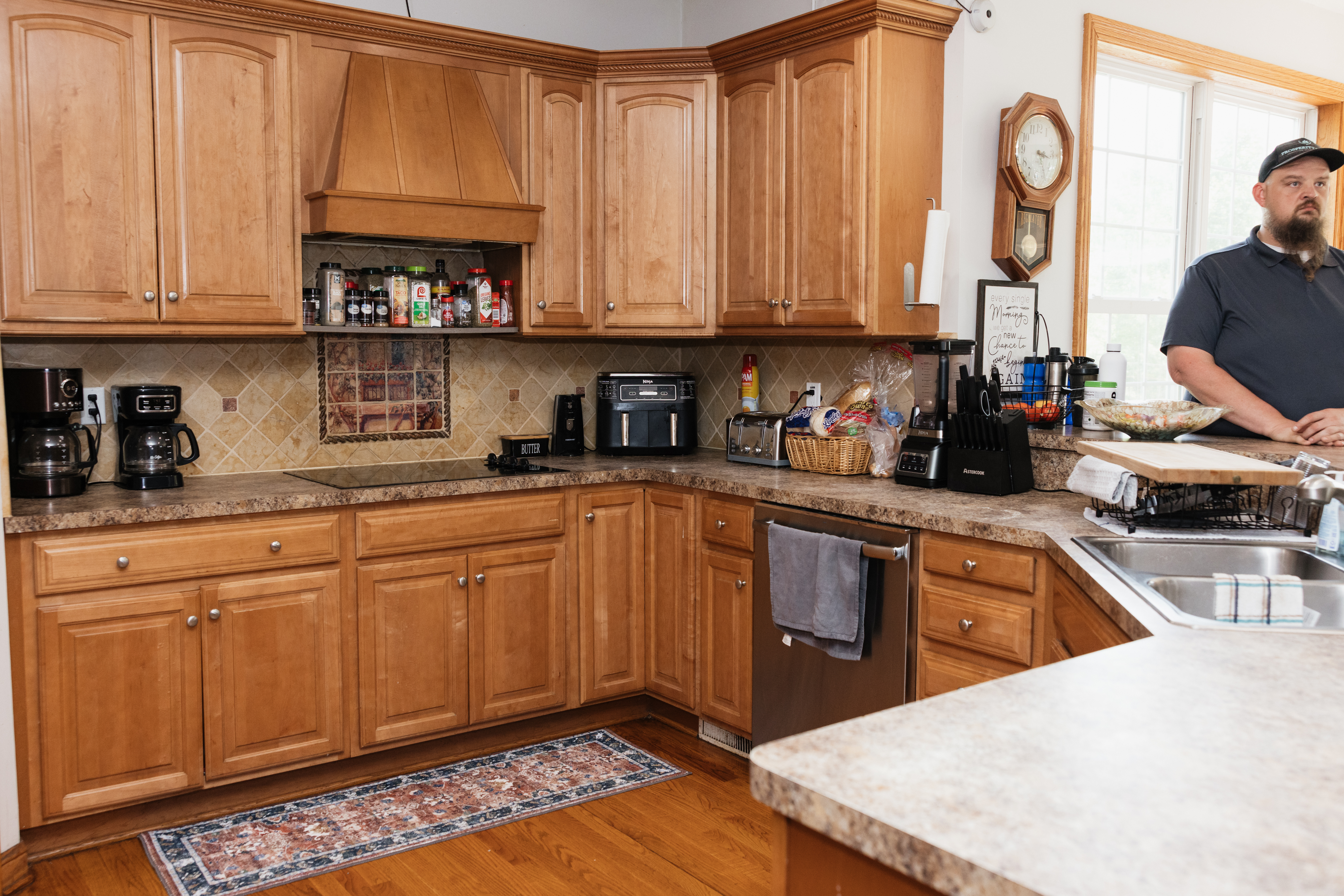 Kitchen with wooden cabinets and modern appliances