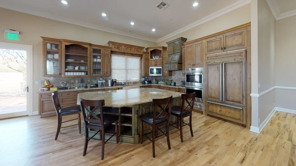 wooden kitchen interior with dining area