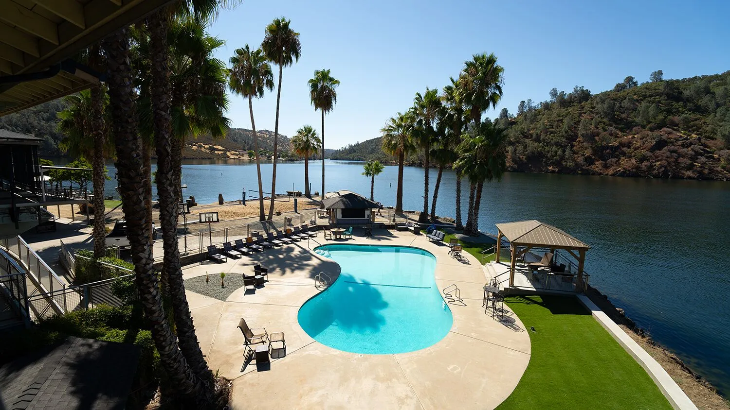 Outdoor swimming pool overlooking the lake at The Lakes Treatment Center