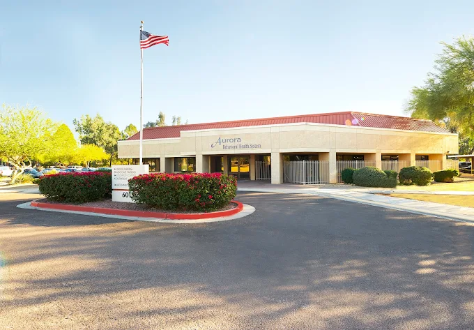 Behavioral health building with flagpole and sign