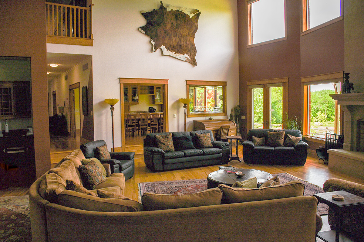 Spacious living room with seating and natural light