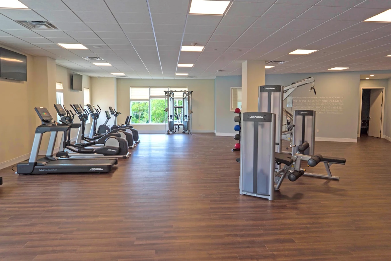 Fitness center with cardio and strength training equipment
