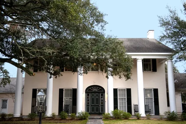 Colonial-style building with tall white columns