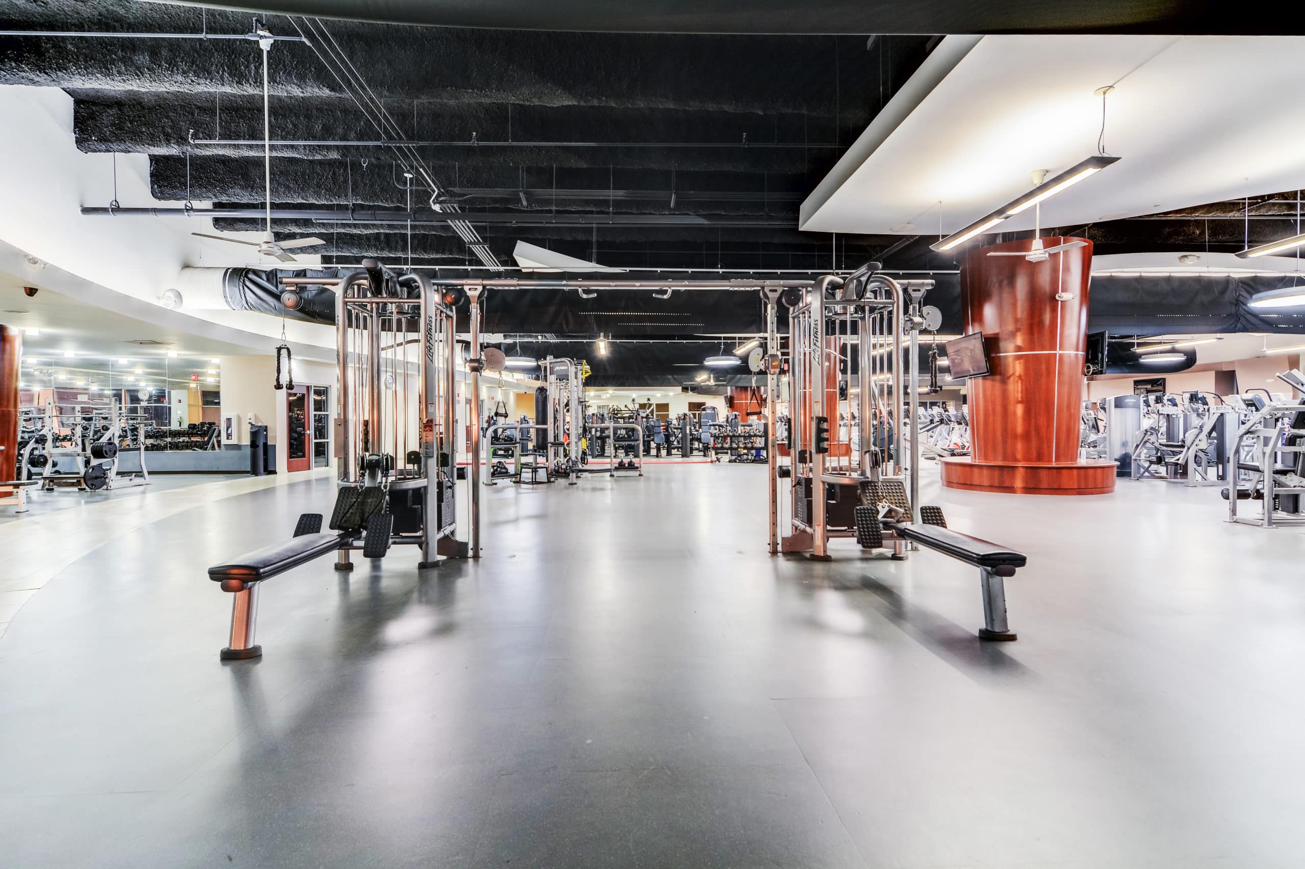Spacious gym facility with modern weight and cardio equipment at SOBA New Jersey