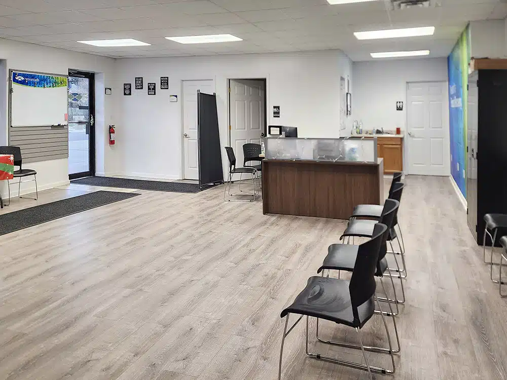 Reception desk with seating area inside Crossroads clinic