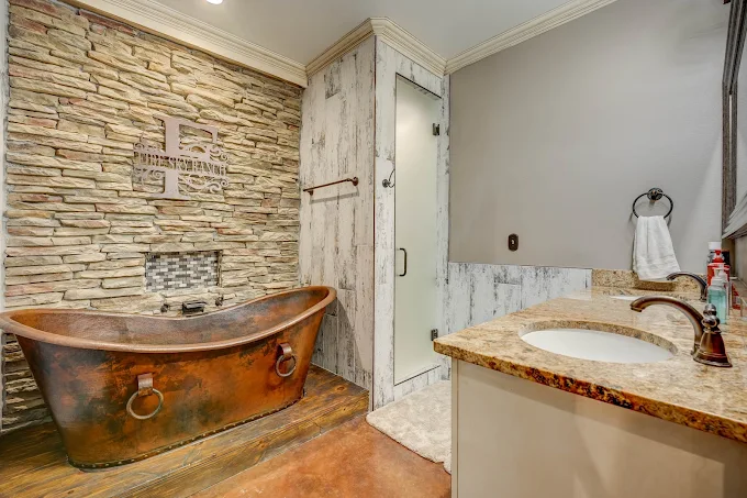 Bathroom with copper soaking tub and walk-in shower