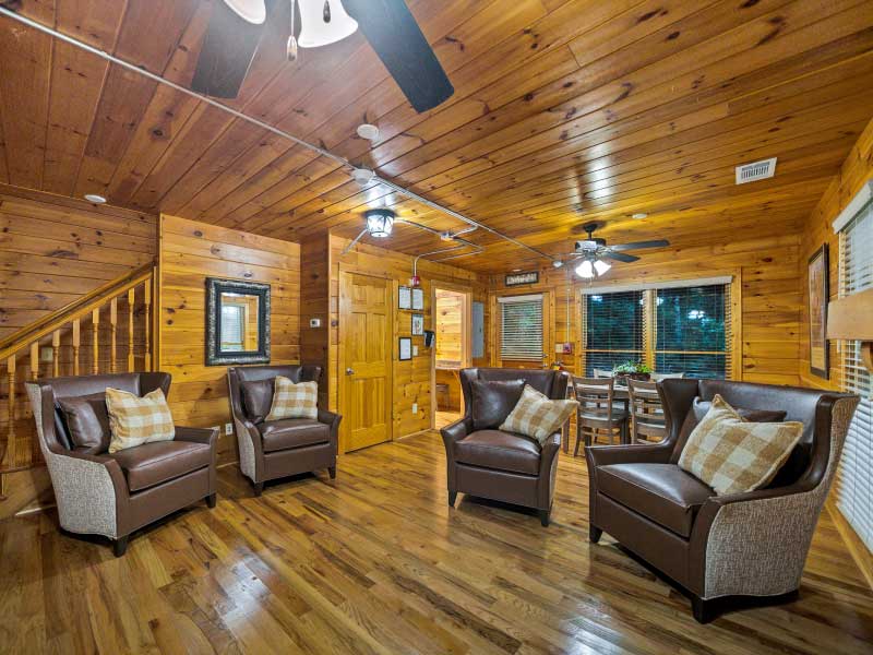 Rustic lounge with armchairs and gathering space