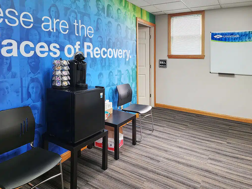 Waiting area with coffee station and mini fridge