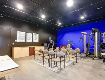 Group meeting room with fitness equipment