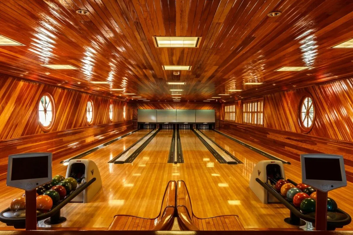 Indoor bowling alley with polished lanes and seating