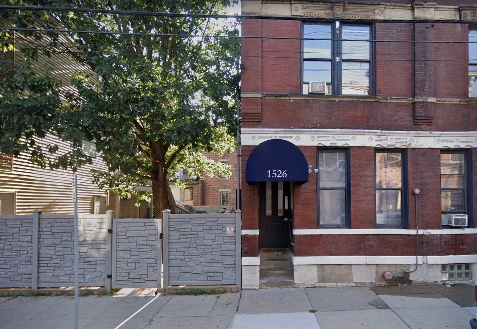 Facility exterior with a blue awning.