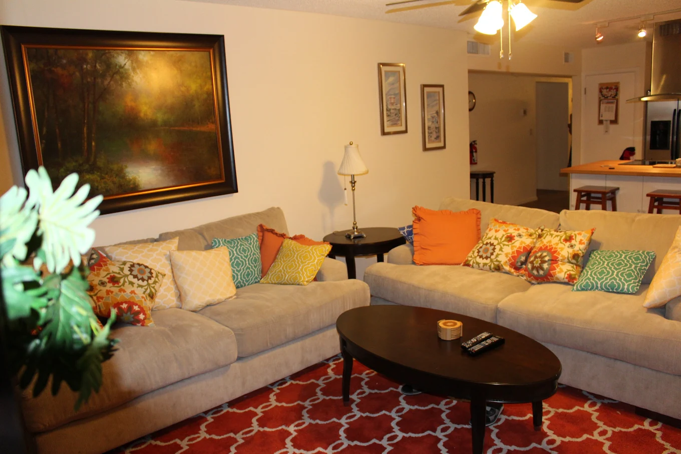 Cozy sofas with pillows and wall art