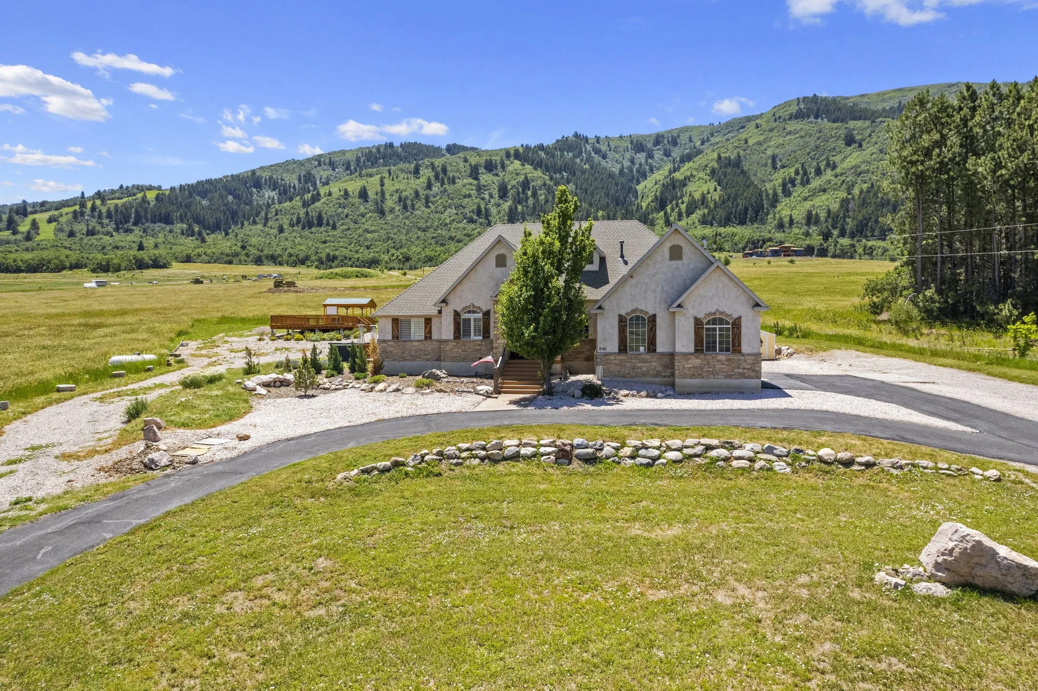 Rehab facility surrounded by green mountains and open fields