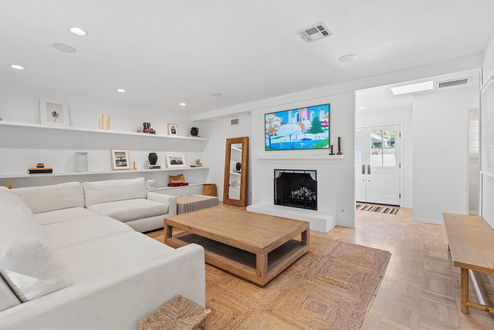 Common room with fireplace and large TV