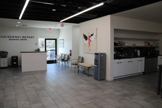 Lobby with seating, water cooler, and open space
